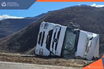 Truck ran off the roadway and overturned